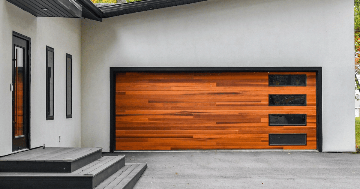 Modern wood garage door with side glass.