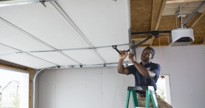 attaching garage door opener to door
